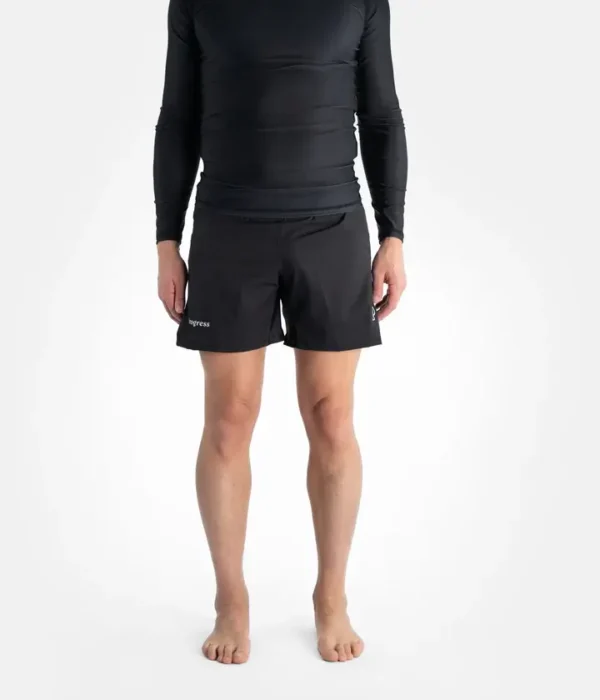 Progress Academy board shorts on white background