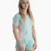 Woman wearing a Progress Academy Women's Rash Guard