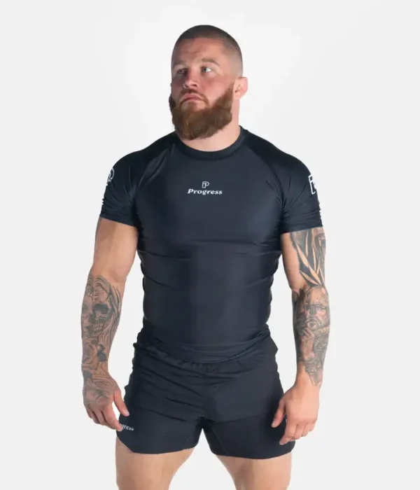 Academy's student wearing Progress Academy Rash Guard Short Sleeve