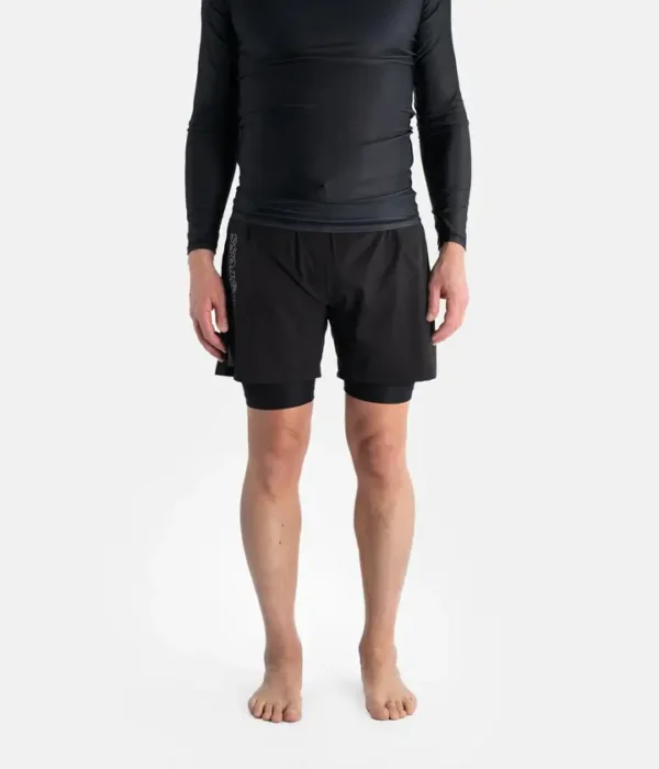 Man wearing Progress Flex Hybrid Shorts