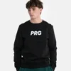 Man wearing a teal Progress PRG Crewneck