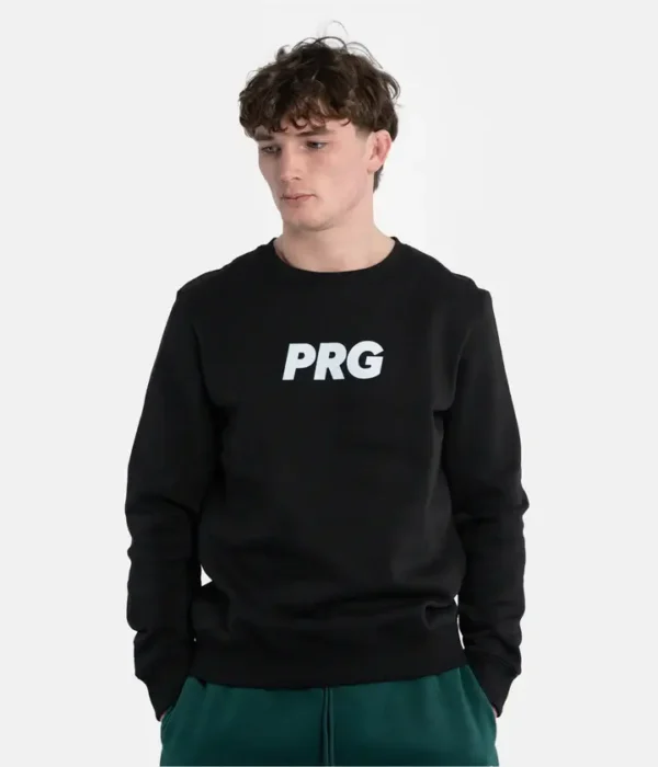 Man wearing a teal Progress PRG Crewneck