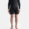 A man in Progress Vasco Board Shorts on the beach