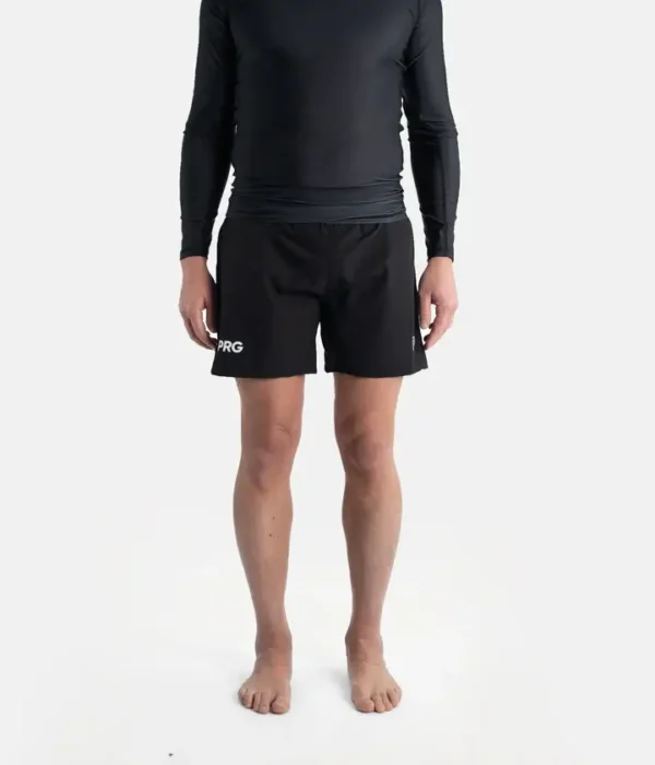 A man in Progress Vasco Board Shorts on the beach
