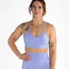 A woman wearing the Progress Eira Ladies Seamless Sports Bra