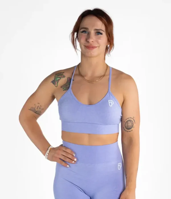 A woman wearing the Progress Eira Ladies Seamless Sports Bra