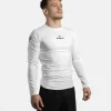 Progress Academy Rash Guard Long Sleeve White 1 Person wearing Progress Academy long sleeve rash guard