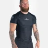 Male athlete wearing the Progress Academy short sleeve rash guard