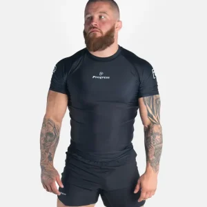 Academy's student wearing Progress Academy Rash Guard Short Sleeve