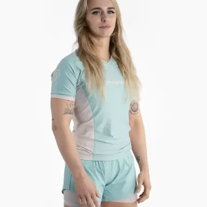 Woman wearing a Progress Academy Women's Rash Guard
