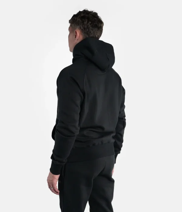 A man wearing the Progress Bengal Hoodie