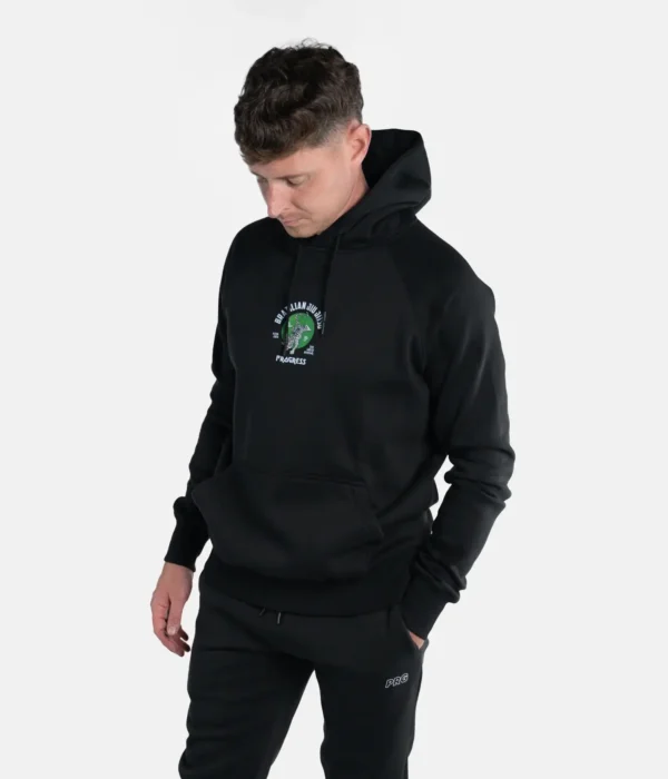 A person wearing a Progress Bengal Hoodie