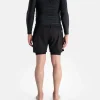 Man wearing Progress Flex Hybrid Shorts