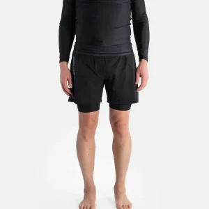 Man wearing Progress Flex Hybrid Shorts