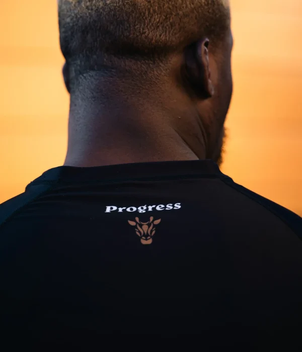 Adult male wearing the Progress Haisam ADCC Rash Guard