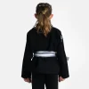 Kid wearing Progress Kids Academy BJJ Gi with a free white belt