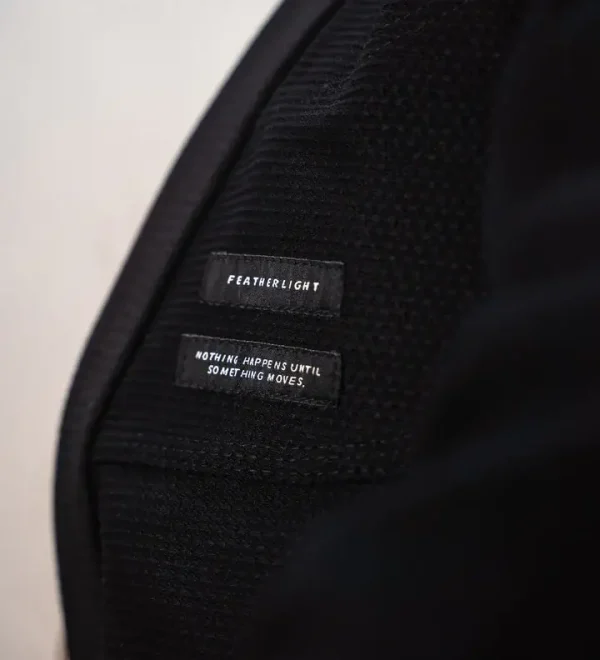 Progress Ladies Featherlight Lightweight Competition Bjj Gi Black 4 Woman athlete wearing a Progress Ladies Featherlight Lightweight Competition BJJ Gi