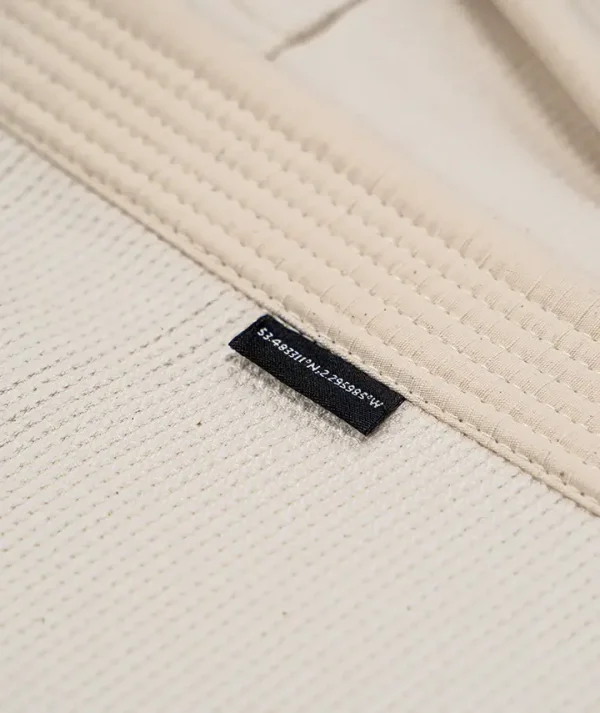Progress Ladies M6 Mark 6 Bjj Gi Unbleached 5 Woman wearing a Progress Ladies M6 Mark 6 BJJ Gi