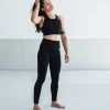 Female athlete wearing Progress Ladies Pro Seamless Grappling Leggings.