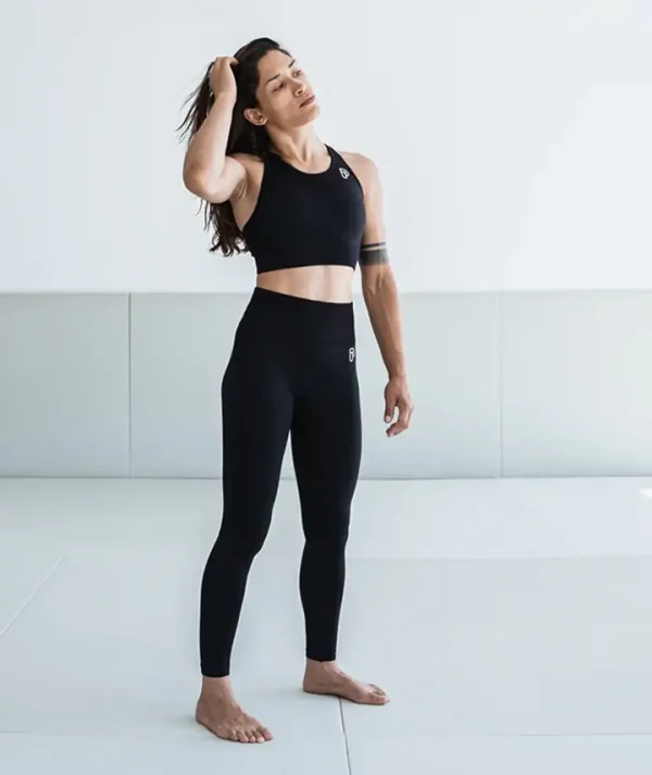 Female athlete wearing Progress Ladies Pro Seamless Grappling Leggings.