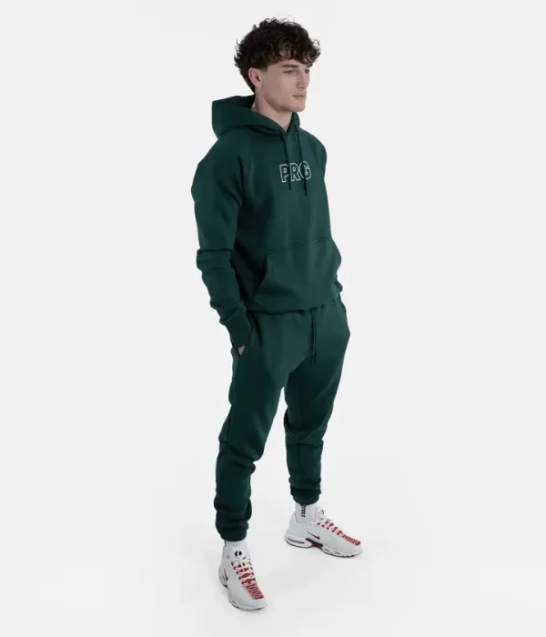 Man wearing a black Progress PRG Hoodie, front view