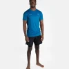 Man wearing "Progress Rolling Tee"