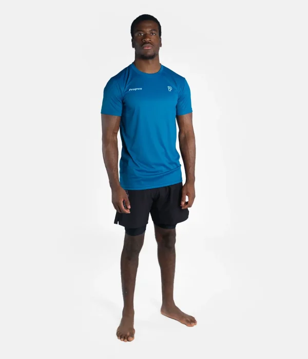 Man wearing "Progress Rolling Tee"