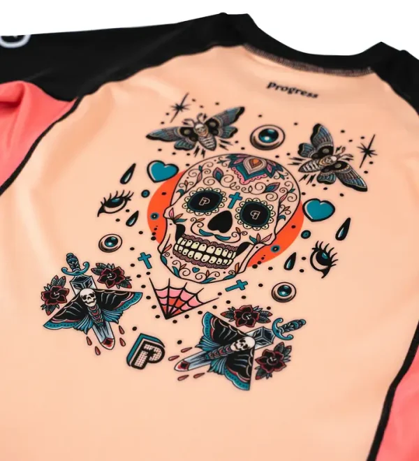 Closeup view of a Progress Sugar Skull Rash Guard