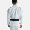 A person wearing Progress The Academy BJJ Gi, with a free white belt included.
