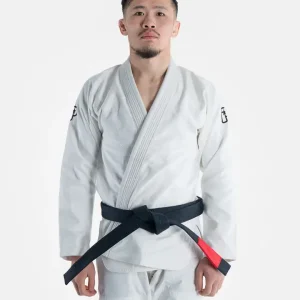 A person wearing Progress The Academy BJJ Gi with a free white belt