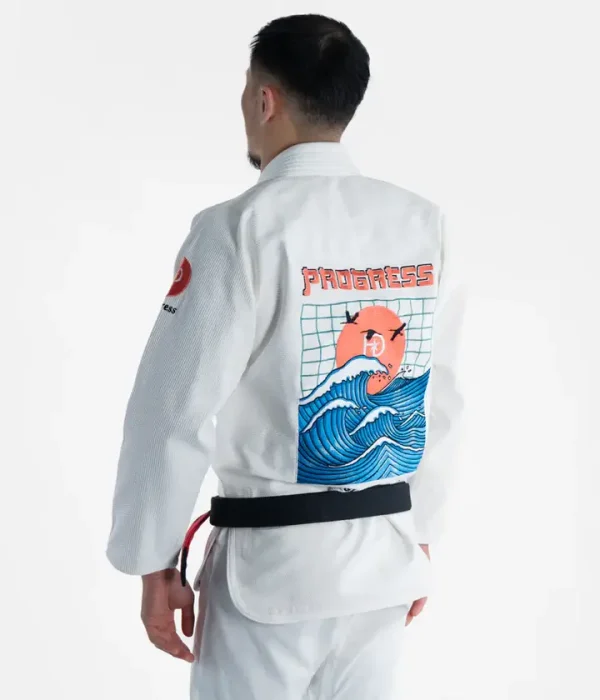 Man wearing Progress Unknown Great Wave BJJ Gi.