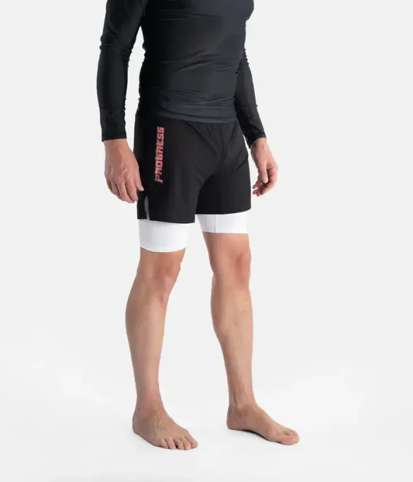 Progress Unknown Great Wave Hybrid Shorts Black 2 A person wearing Progress Unknown Great Wave Hybrid Shorts