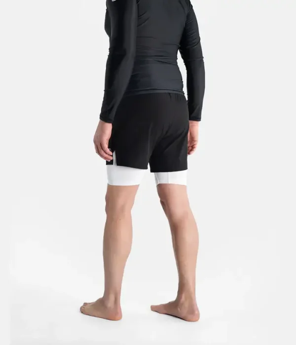 Progress Unknown Great Wave Hybrid Shorts Black 3 Man standing whilst modeling Progress Unknown Great Wave Hybrid Shorts