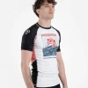 Man wearing Progress Unknown Great Wave Rash Guard designed with dynamic wave print