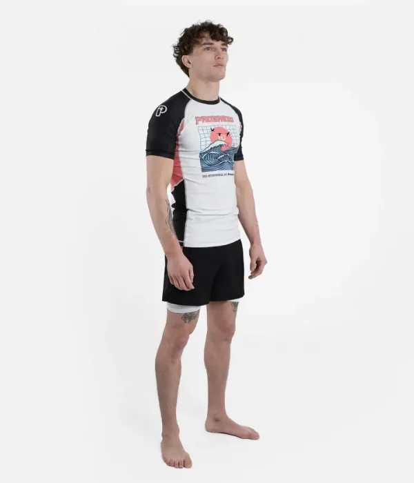 Person wearing Progress Unknown Great Wave Rash Guard
