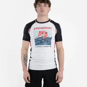 A model wearing the 'Progress Unknown Great Wave Rash Guard.'