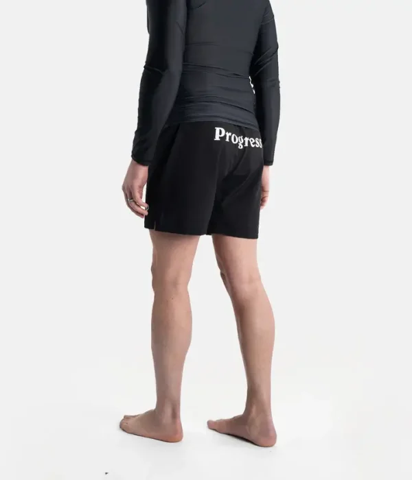 Man wearing Progress Vasco board shorts