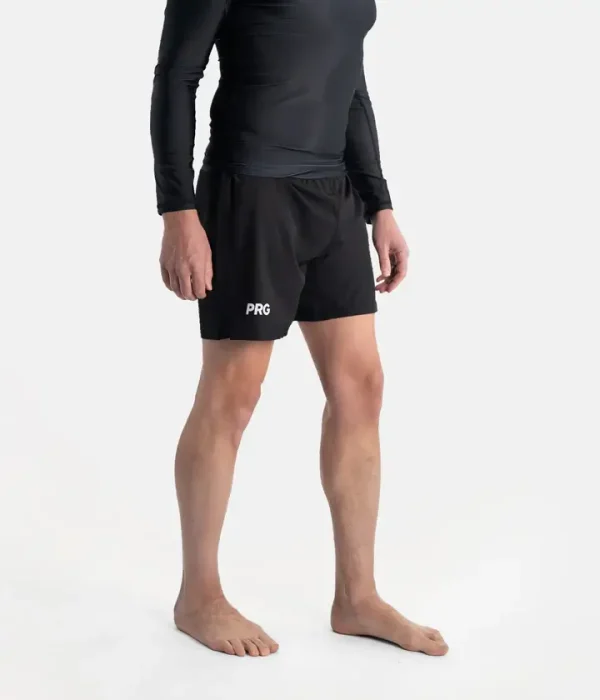 Man wearing Progress Vasco Board Shorts