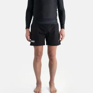 A man in Progress Vasco Board Shorts on the beach
