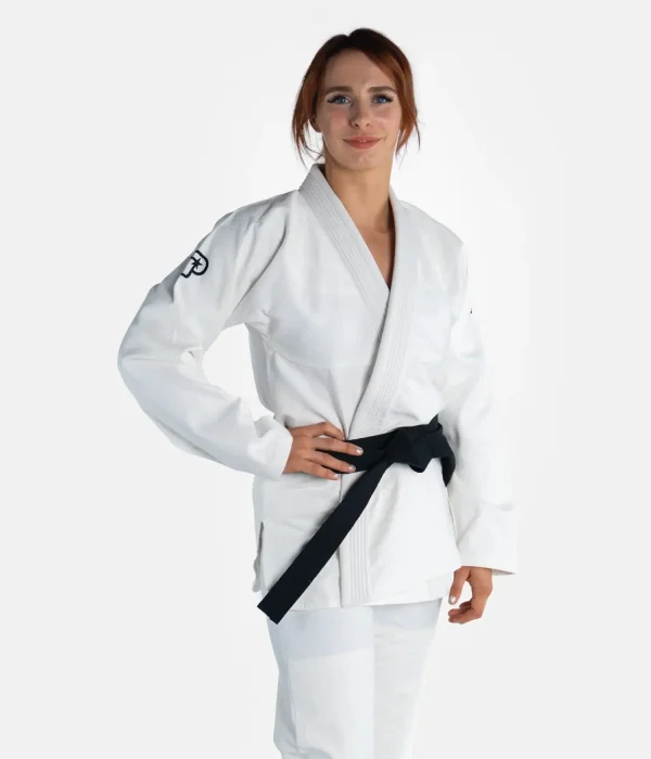 Woman wearing Progress Women's Academy BJJ Gi with a white belt