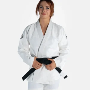 Woman wearing Progress Women's Academy BJJ Gi with a free white belt
