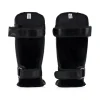 Fairtex Sp3 Double Padded Shin Guards Black 1 Skilled athlete wearing Fairtex SP3 Double Padded Shin Guards for combat sports training