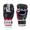 A pair of Fairtex Super Sparring MMA Gloves FGV18 in the boxing ring