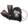 Boxing gloves by Fairtex and Tom Atencio with Heart of the Warrior design