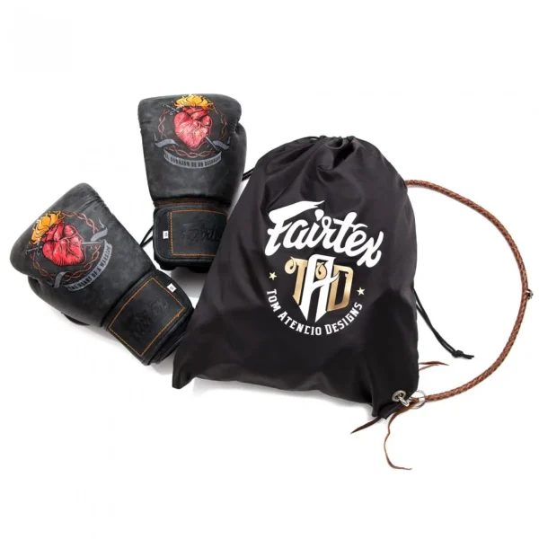 Boxing gloves by Fairtex and Tom Atencio with Heart of the Warrior design