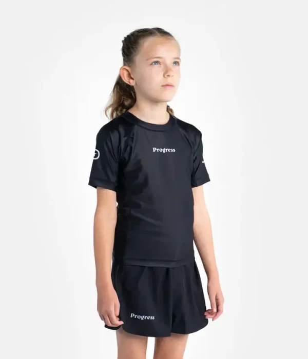 Kids wearing Progress Kids Academy Rashguards
