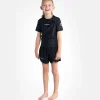 Child modeling Progress Kids Academy Rashguard
