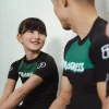 Kid wearing Progress Kids Bengal Rash Guard
