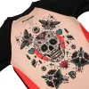 Kid wearing a vibrant Progress Kids Sugar Skull Rash Guard