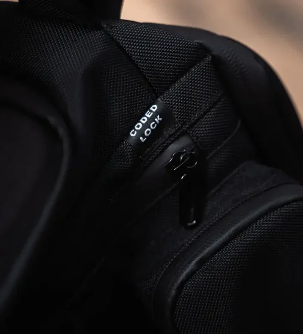 Progress Kit Bag - Black in Black — logo close‑up